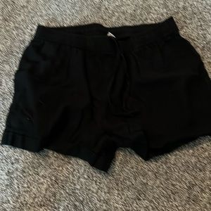 Women’s black shorts.